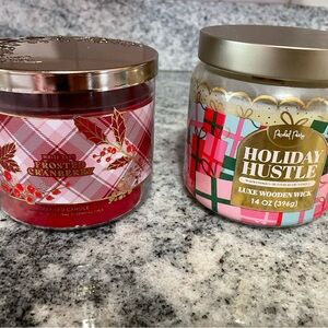 2 New candles. White Barn Frosted Cranberry & Rachel Ray Holiday Bustle.